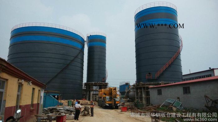 聊城國華鋼板倉專業(yè)改造水泥鋼板庫出料系統(tǒng)、水泥庫、粉煤灰?guī)斐霾粊砹暇驼伊某菄A鋼板倉